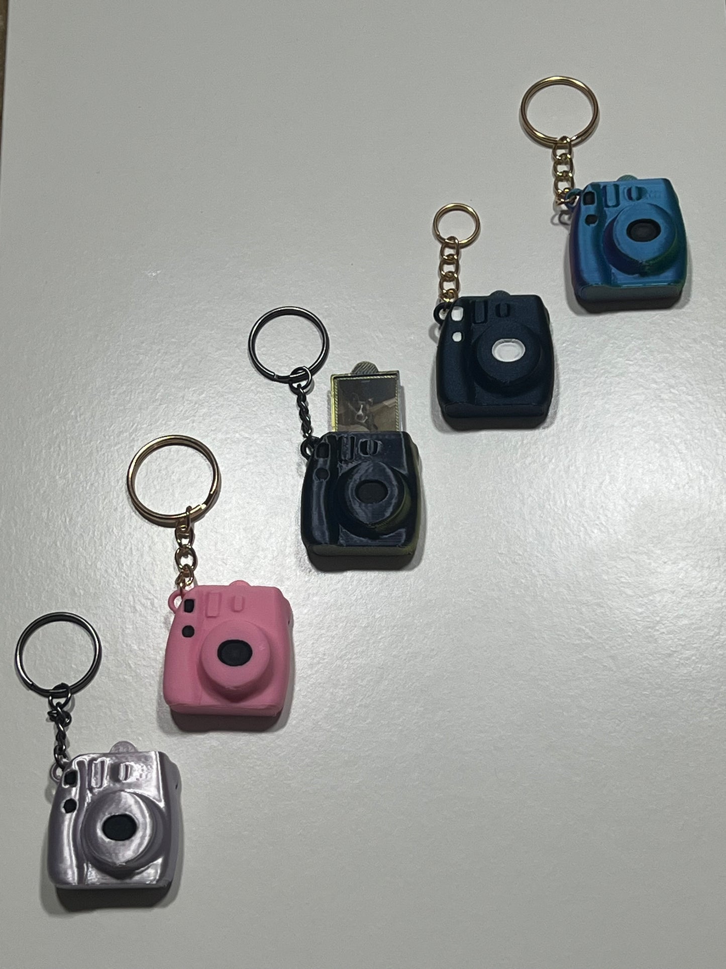 Camera keychain with photo slot